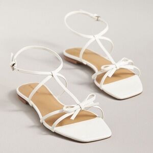 Reformation white patent leather bow sandals